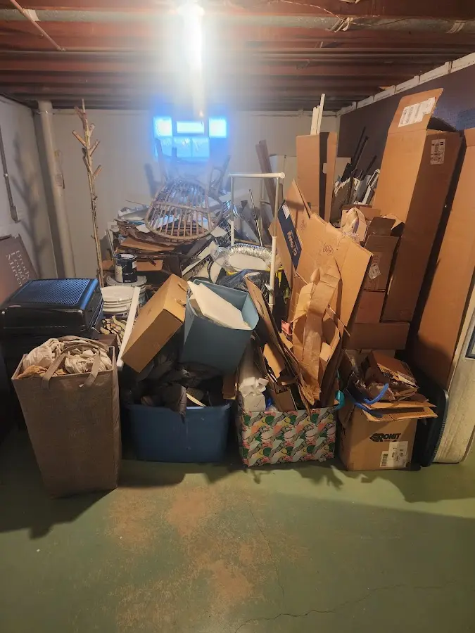 Roll-off dumpster container at job site for 2 Yard Dumpster Rental in Juniper Canyon